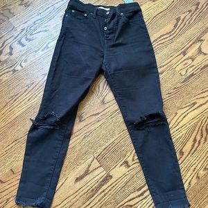 Levi’s distressed black skinny jeans size 27